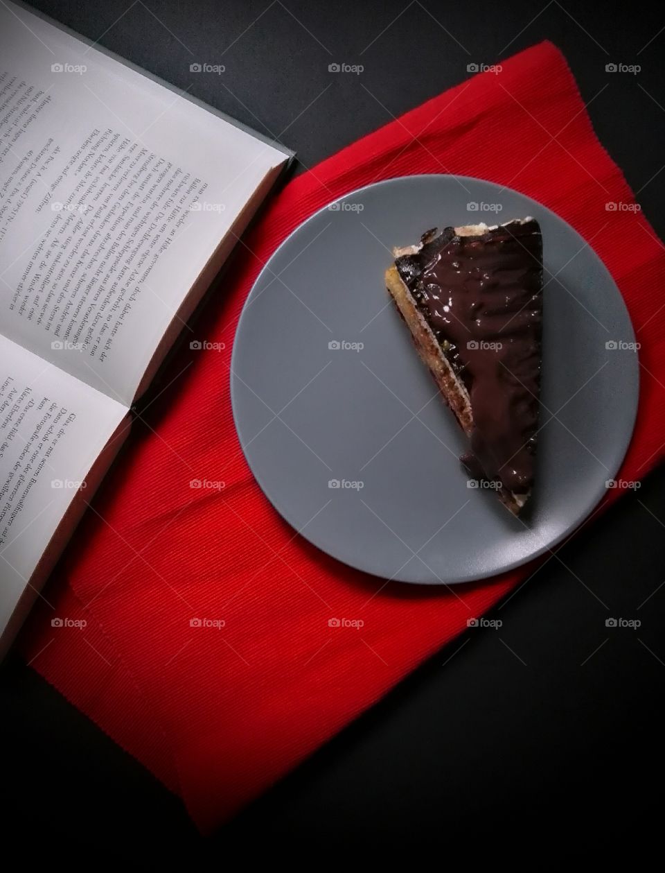 chocolate cake and book, cold evening