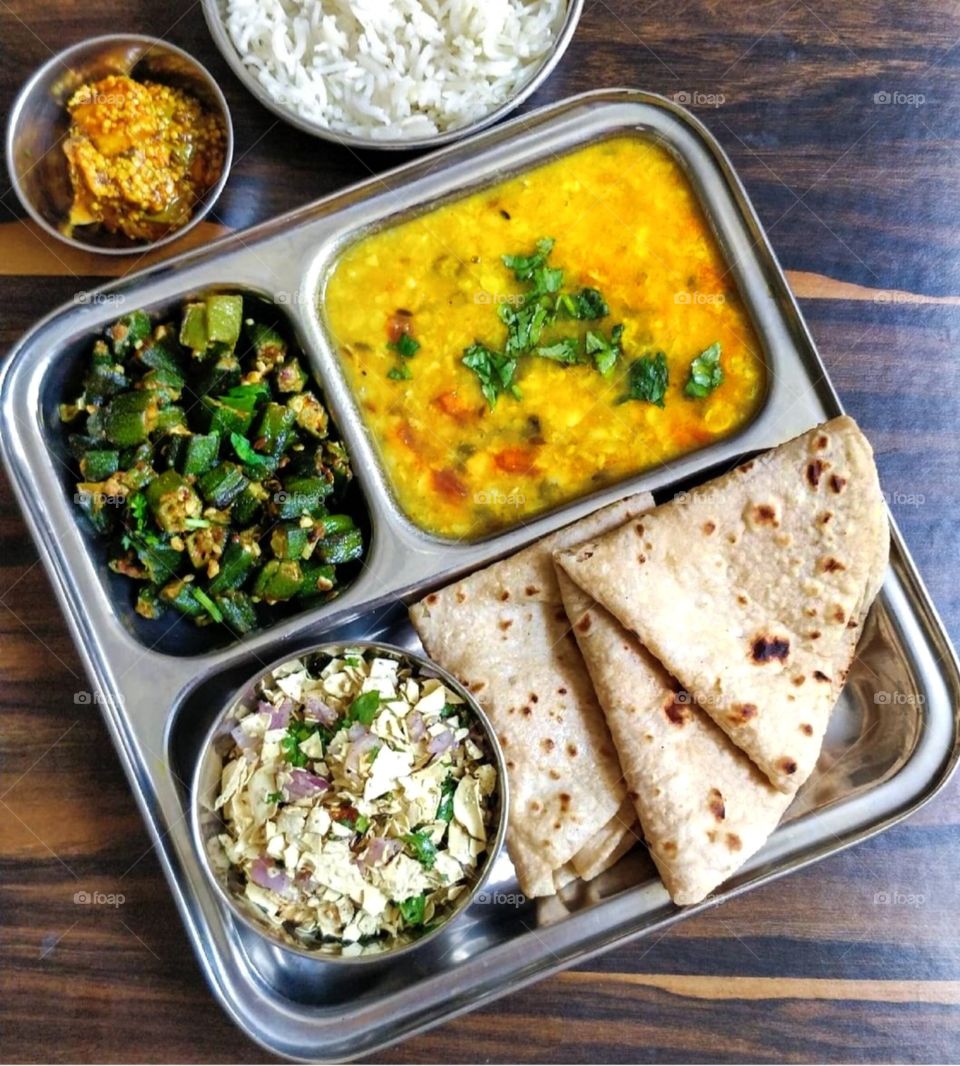 In this photo I captured a colorful yummy Indian lunch meal