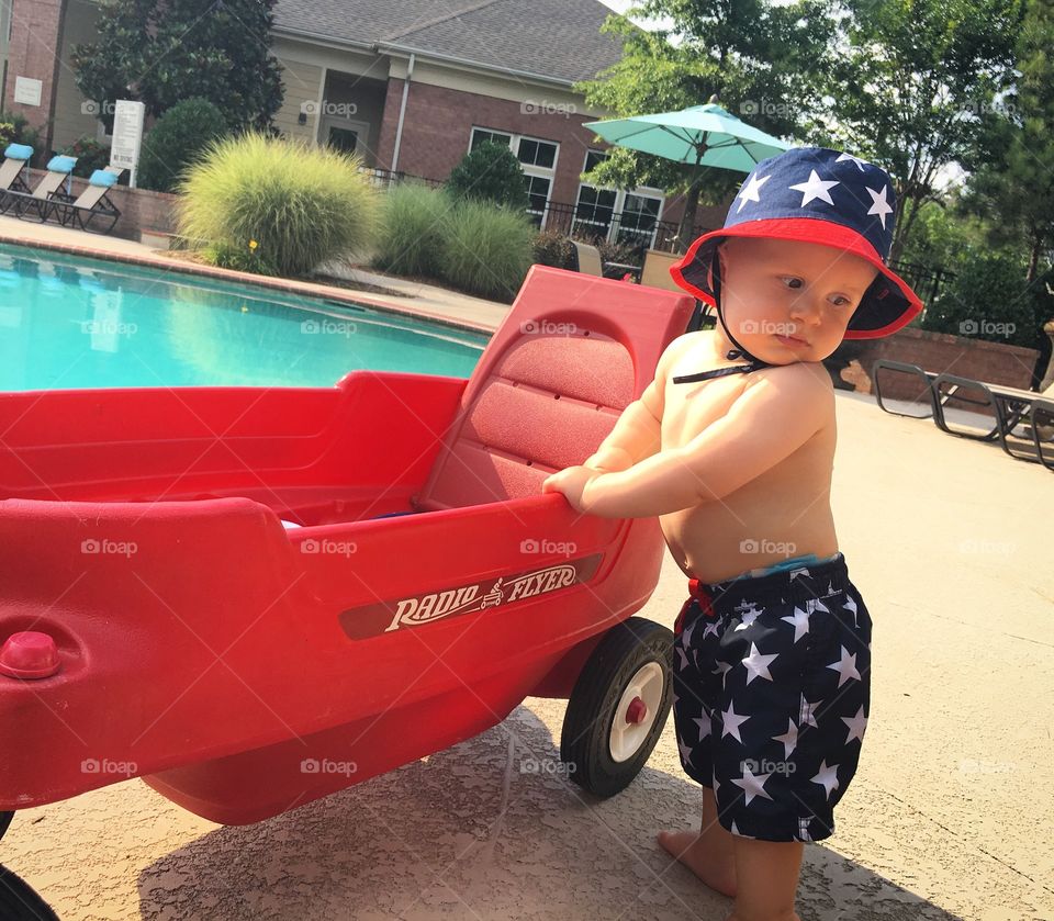 Little boy at the pool