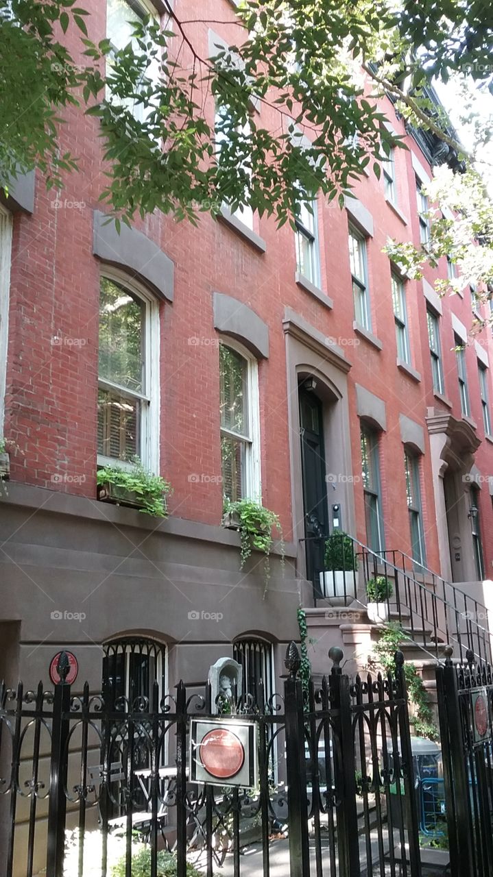 Exterior of red brick building NYC