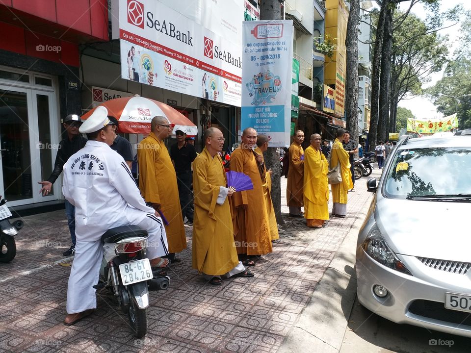 monks on the street in Saigon