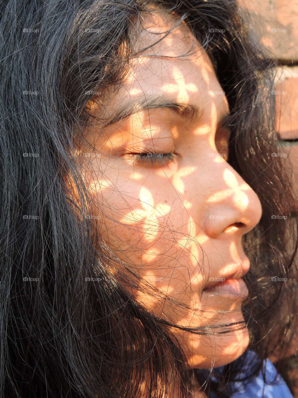 Sunlight falling on face