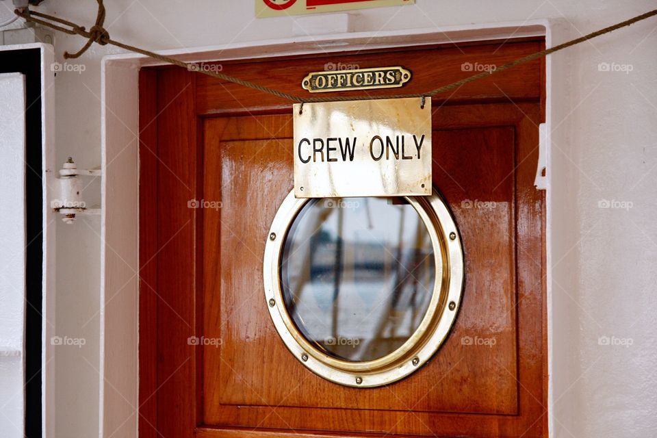 Sign ‘crew only’ on the ship 