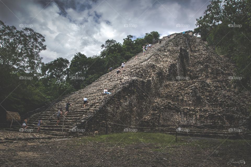"Nohoch Mul -Coba" this is the highest pyramid in Yucatan. Opened to the public as an archeologist site in 1973. This Mayan site is still largely unexcavated making it a true wonder in Yucatan. I had the opportunity to visit it a year ago and had the perfect day for it, accentuating its mystery around it. Hope you like! 