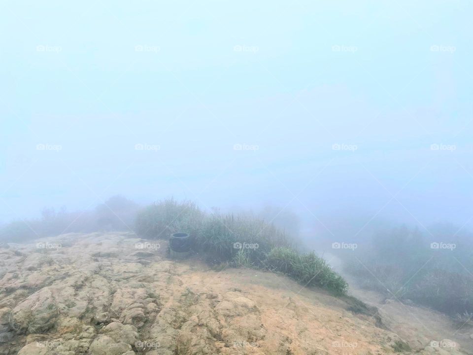 surrounded by clouds