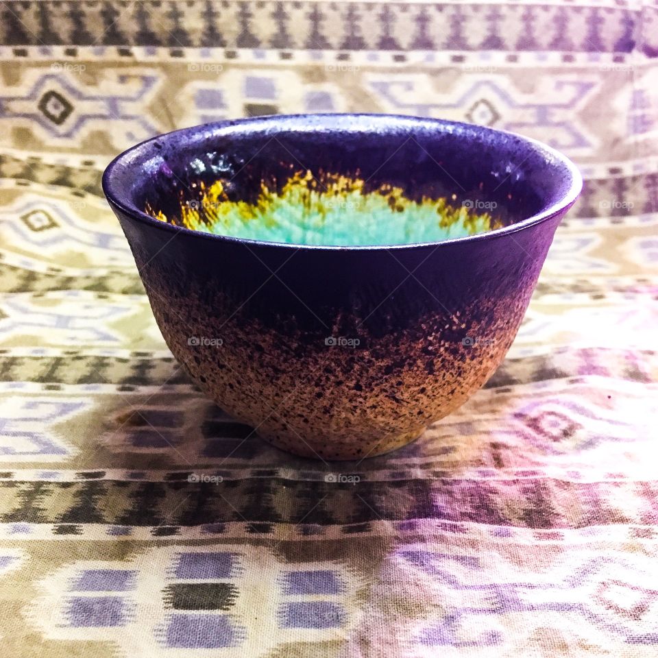 A small cup with so much detail and color, for only 99¢ at a thrift store.