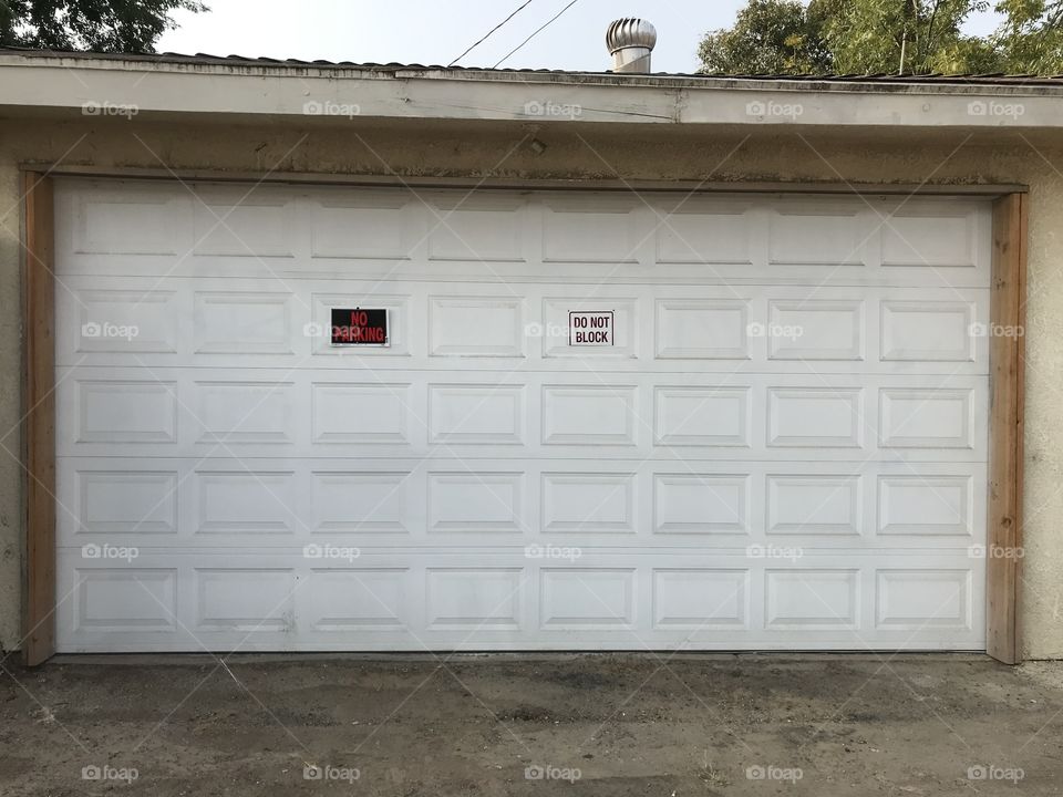 Garage. No vehicles are allowed to block the door of the garage since it is in the back alley.