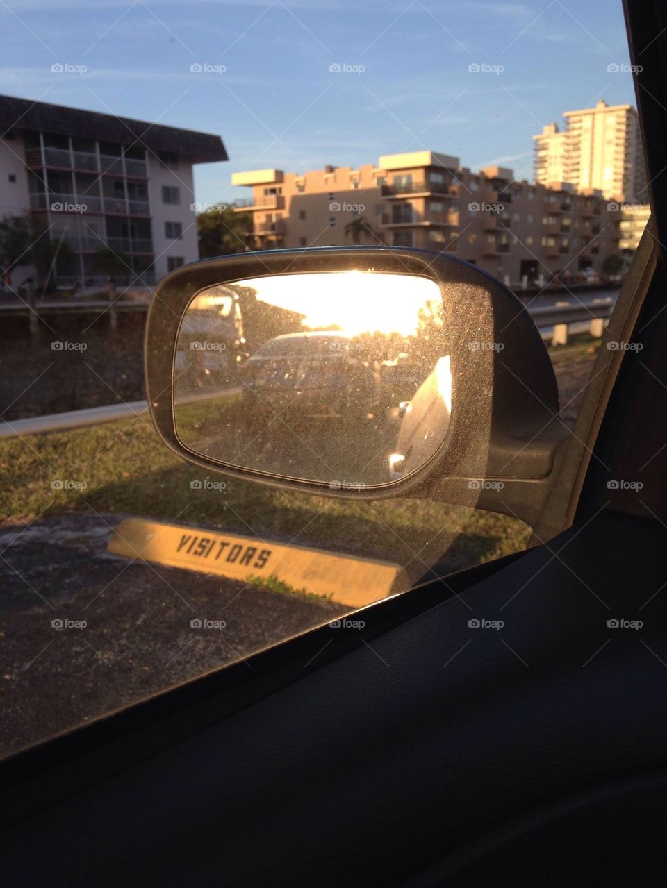 Sunset through the rear view mirror