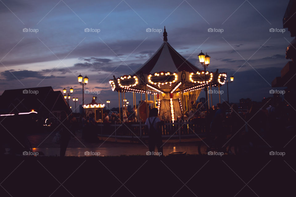 sunset and merry-go-round