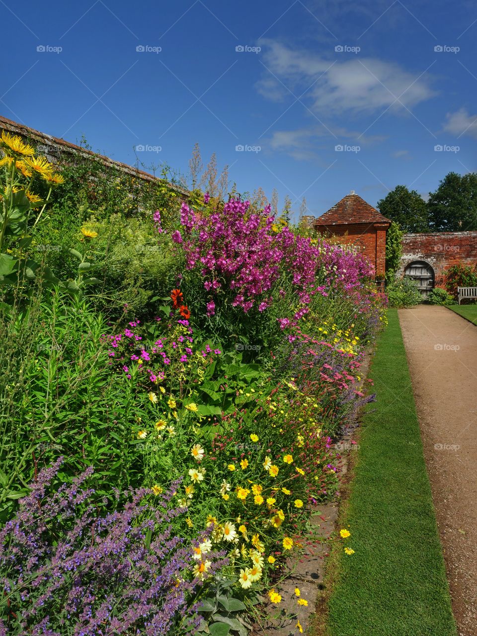 	Formal gardens of Packwood House stately home - Warwickshire, England UK.