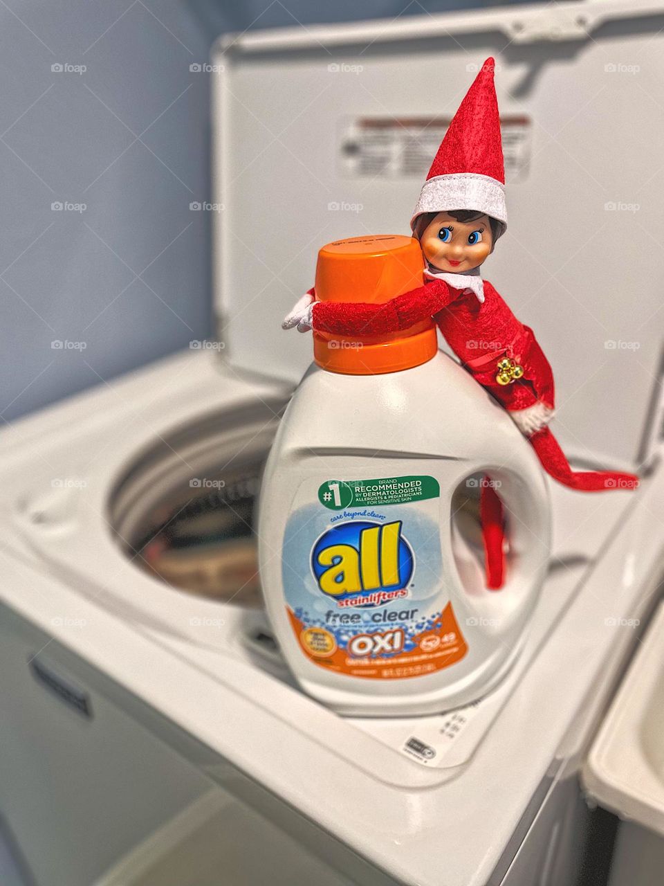 Elf on a Shelf helps with laundry, little laundry helper, elf on a shelf antics, elf helps around the house 