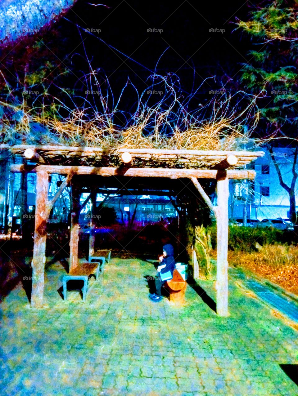 Winter Night & a little Boy holding A notebook on his arms under the wooden resting place alone in the dark.
He said, its quite around here.
He wants a few time to rest.
what's in his mind to rest in this dark & cold place?
even a child need a space.