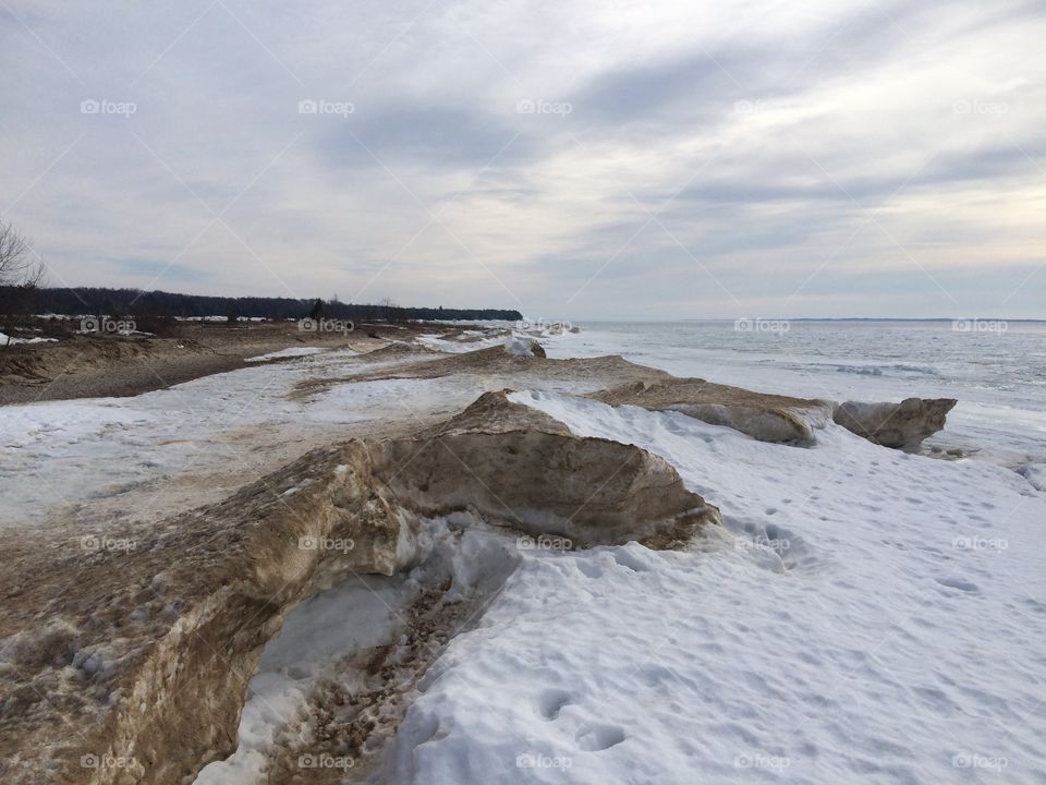 Sand on ice Lake Michigan 