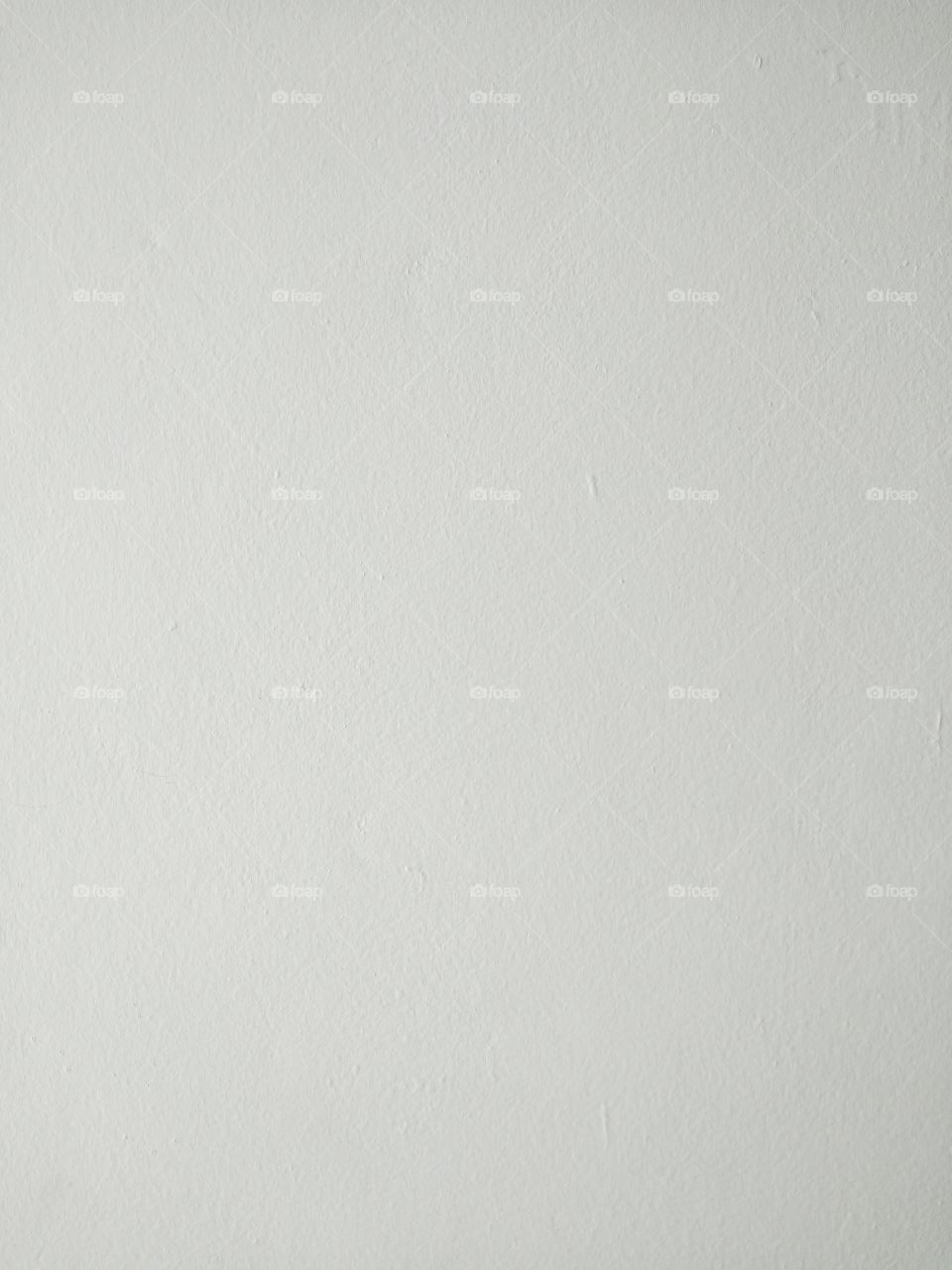 Clean white concrete wall for background.