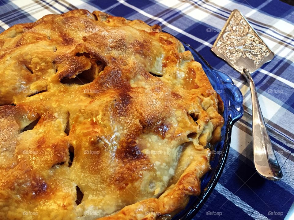 Pie. A delicious apple pie waiting to be served.