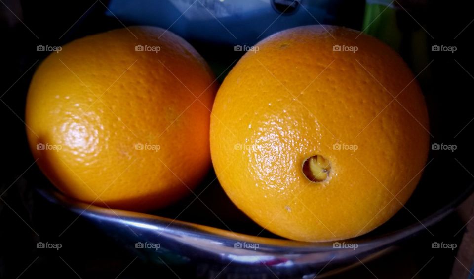 Navel Oranges in a Silver Bowl