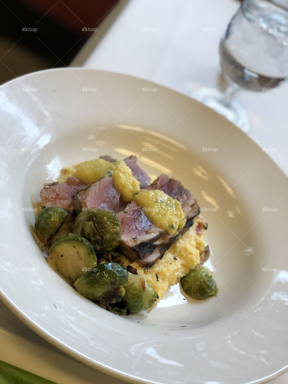 Tuna steak dish w/ Brussels sprouts and polenta