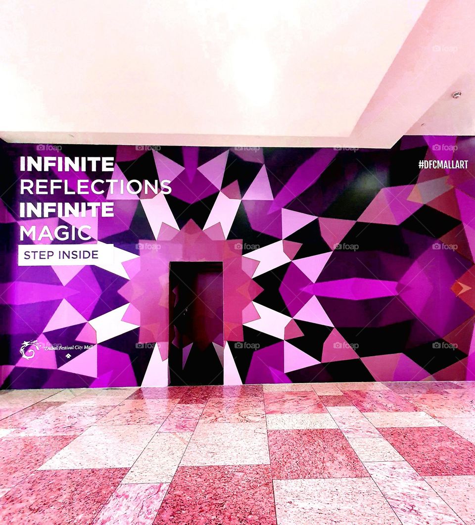 Purple wall in a shopping centre 💜