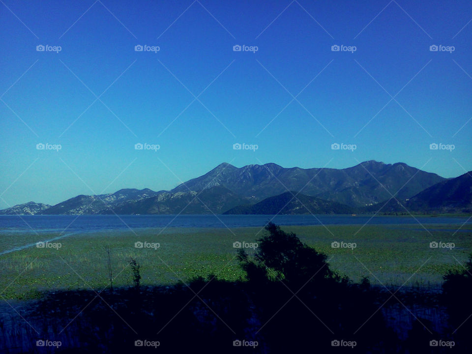 gro, europe, blue sky, mountains and lake with lotos