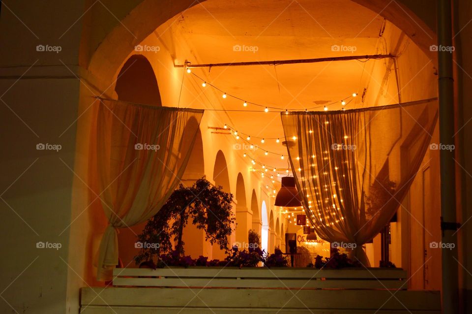 summer kitchen in the castle of Bushse lightness of evening parties breeze and pleasant lighting and curtains