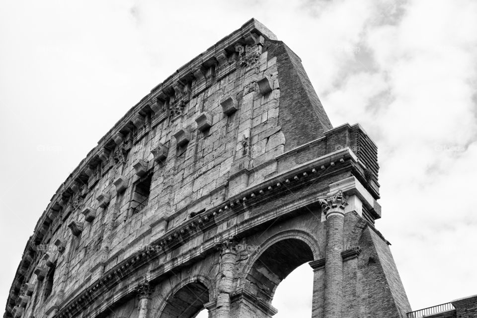 looking up at the colosseum in Rome Italy
