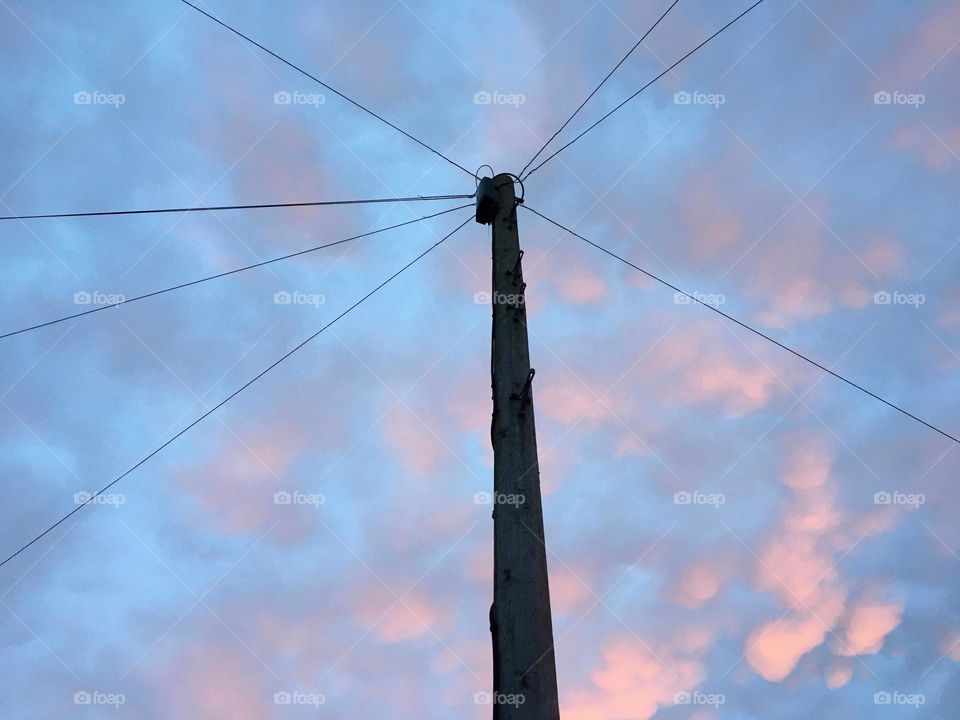 Snapping a shot of the beautiful sky adding  a telegraph pole for the subject … not sure if it meets minimalistic criteria with seven wires protruding outwards or whether the clouds are too much of a distraction … a wild card entry perhaps ?