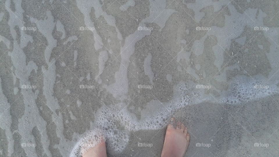 Footprints in the Surf
