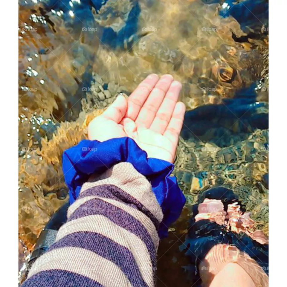 Hand in water