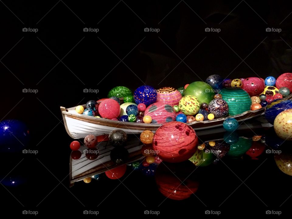 Colorful art floating on a boat at the Chihuly Garden and Glass in Seattle, Washington.