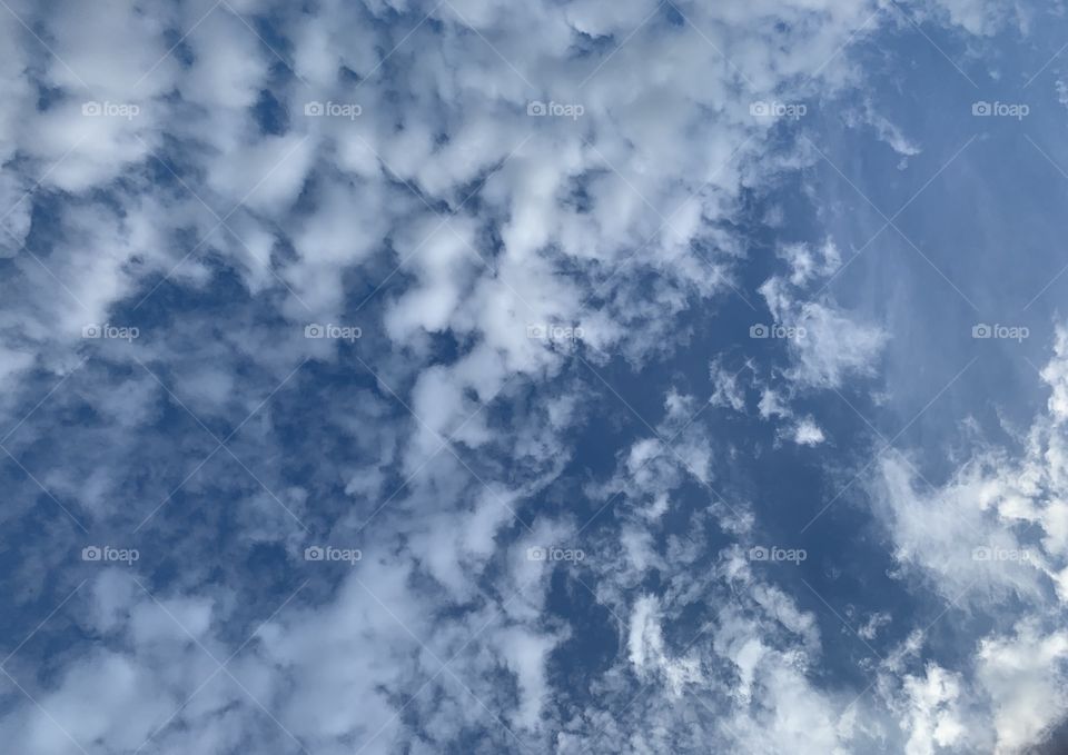 Clouds within the blue sky 