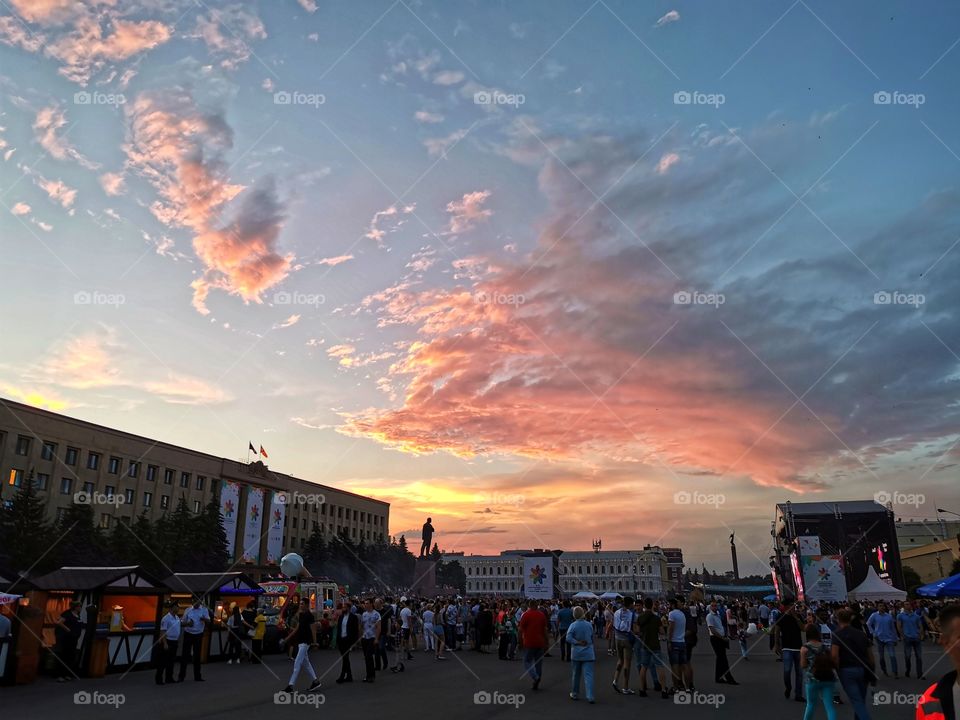 Sunset sky mood clouds moody nature greens wild outdoor outside joy happy people crowd festival party