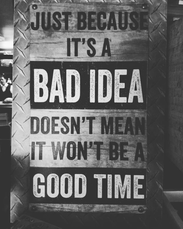 A sign in a bar