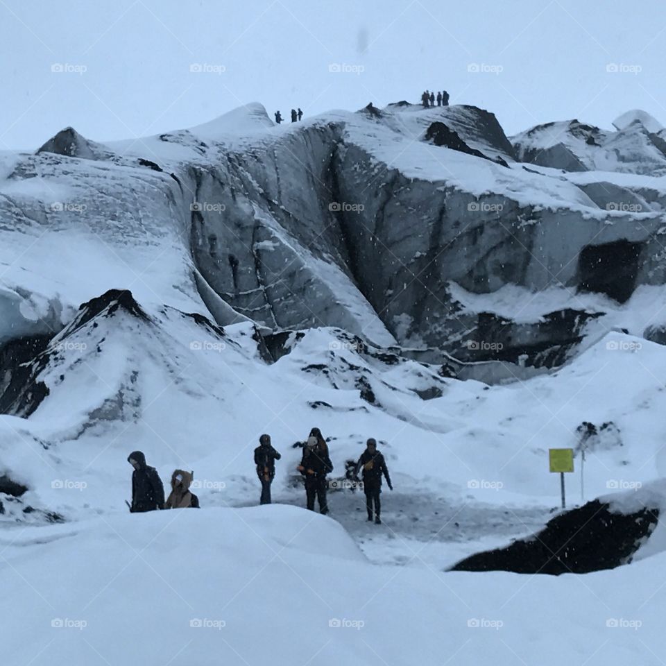 Scaling a glacier in Iceland 