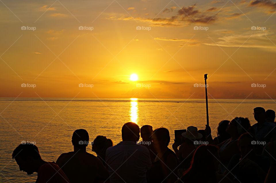 Sunset and people at Rick's Café Jamaica