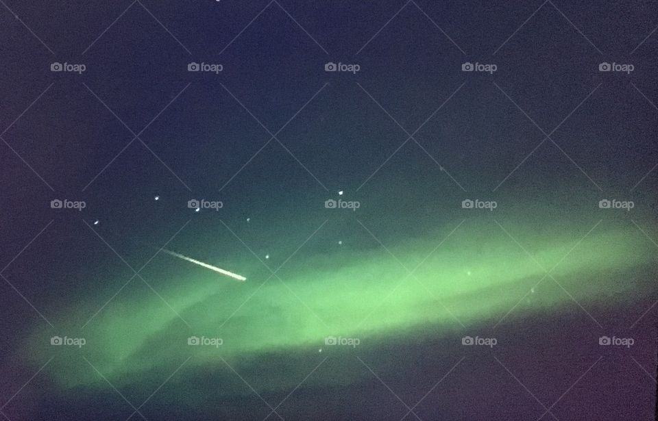 Meteor during the aurora borealis 