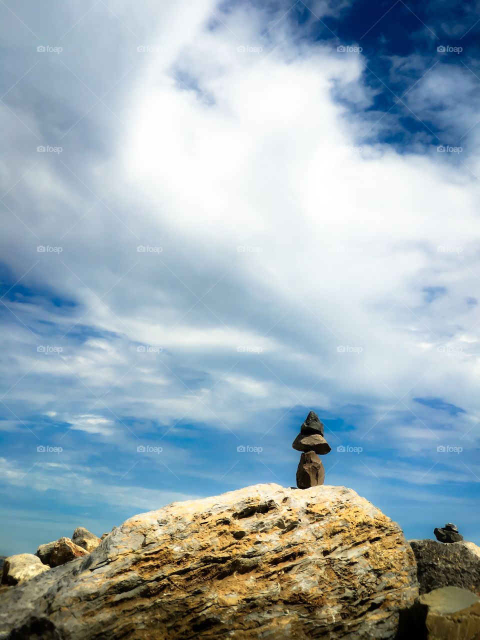 Two stone stacks balanced rocks at ocean conceptual possibilities 