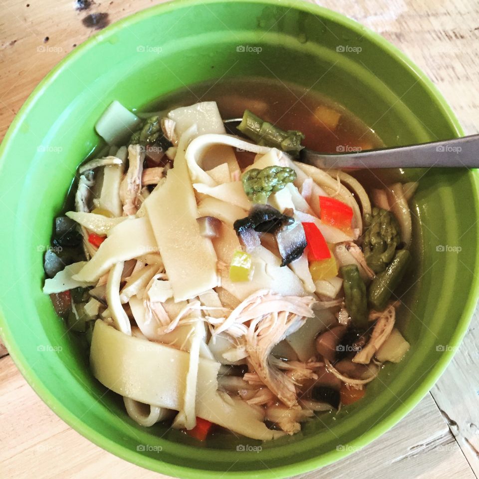 Homemade bone broth chicken noodle soup.