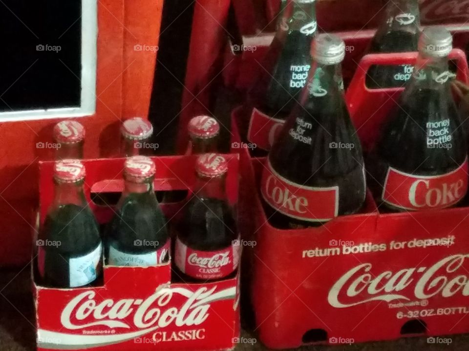 Bottle Packs of Classic Coke-a-Cola and large bottles of Coke-a-Cola