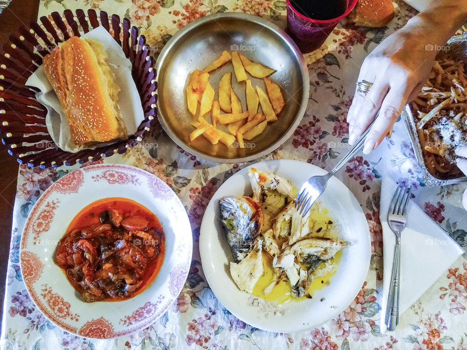 eggplant with red sauce, fish and chips