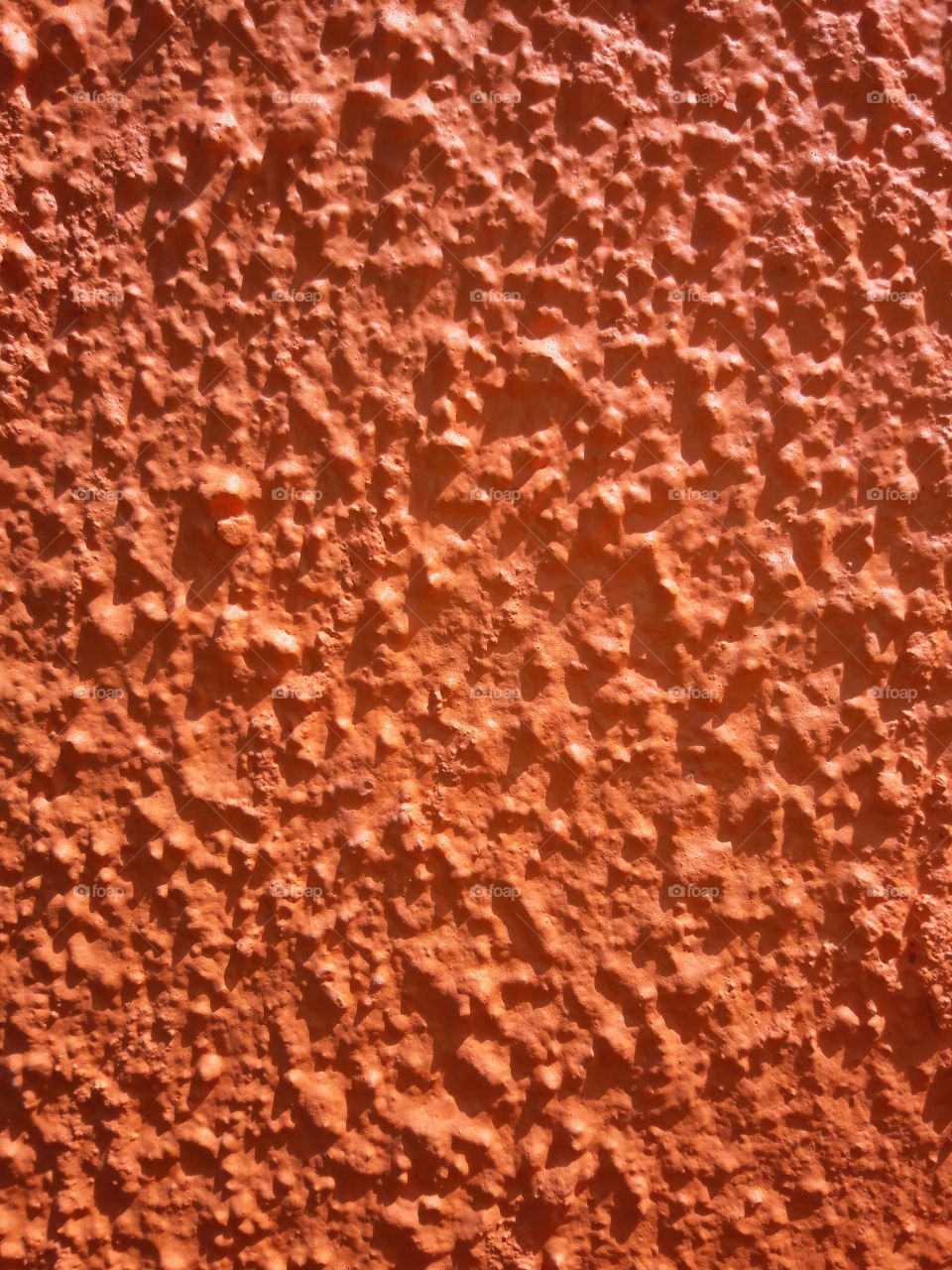 orange rock stone pattern design at sunset fron skyfall