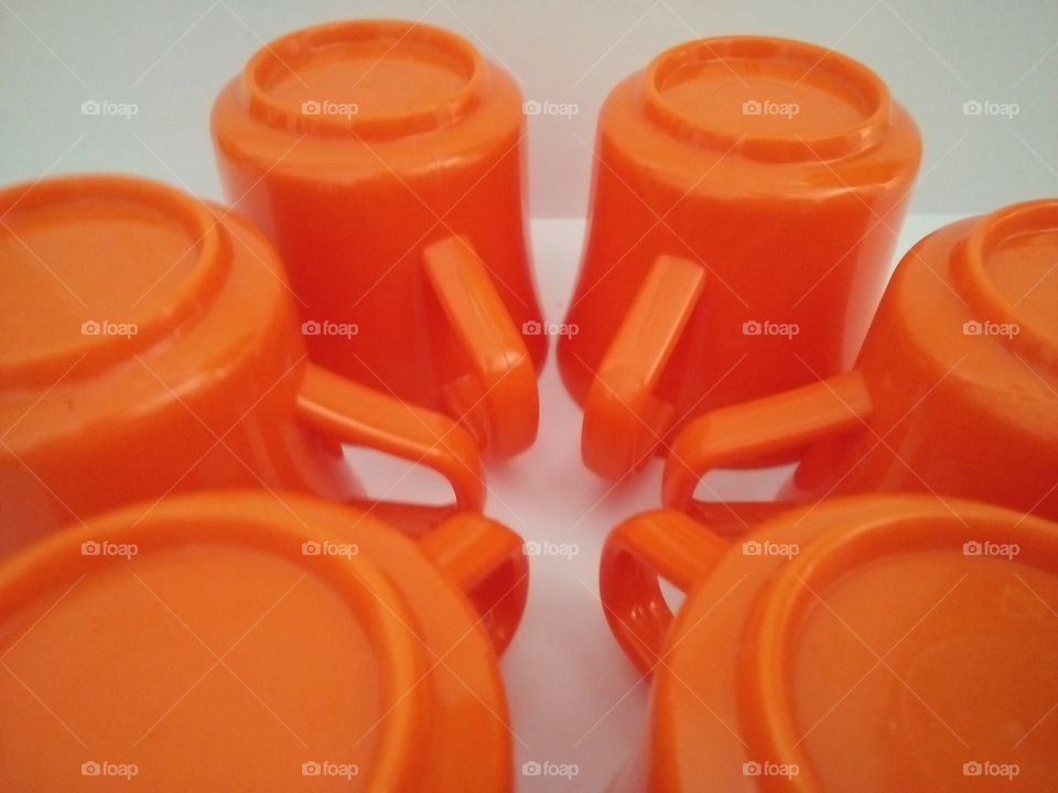 Arrangement of orange cups