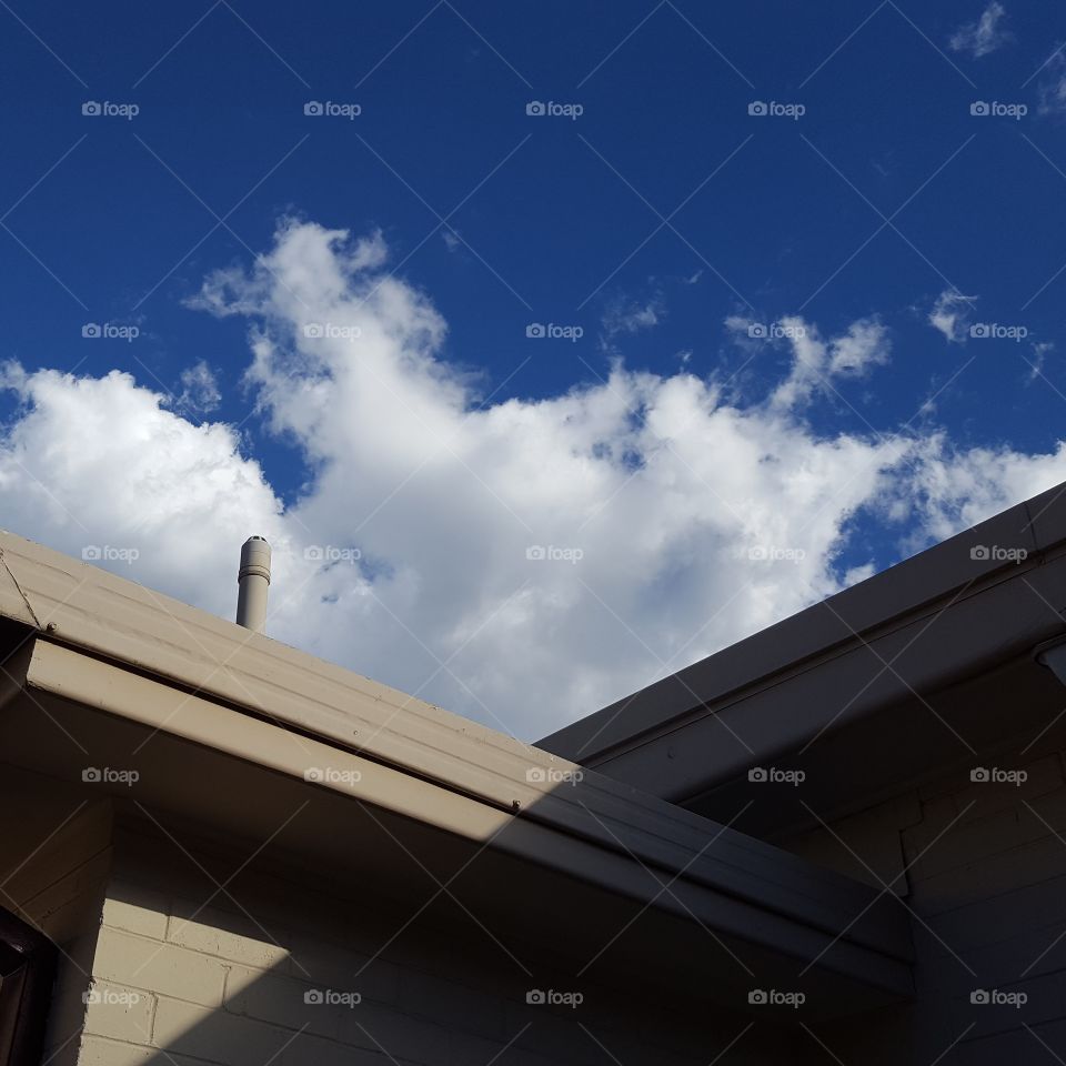 Building with cloudy sky