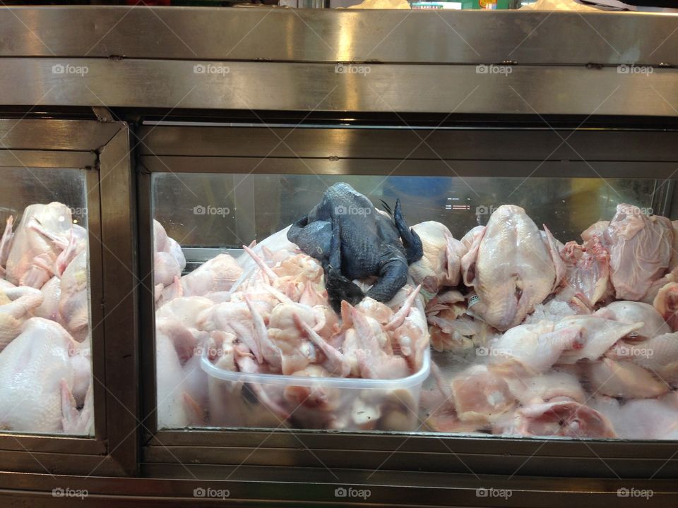 Black chicken at market in Singapore 