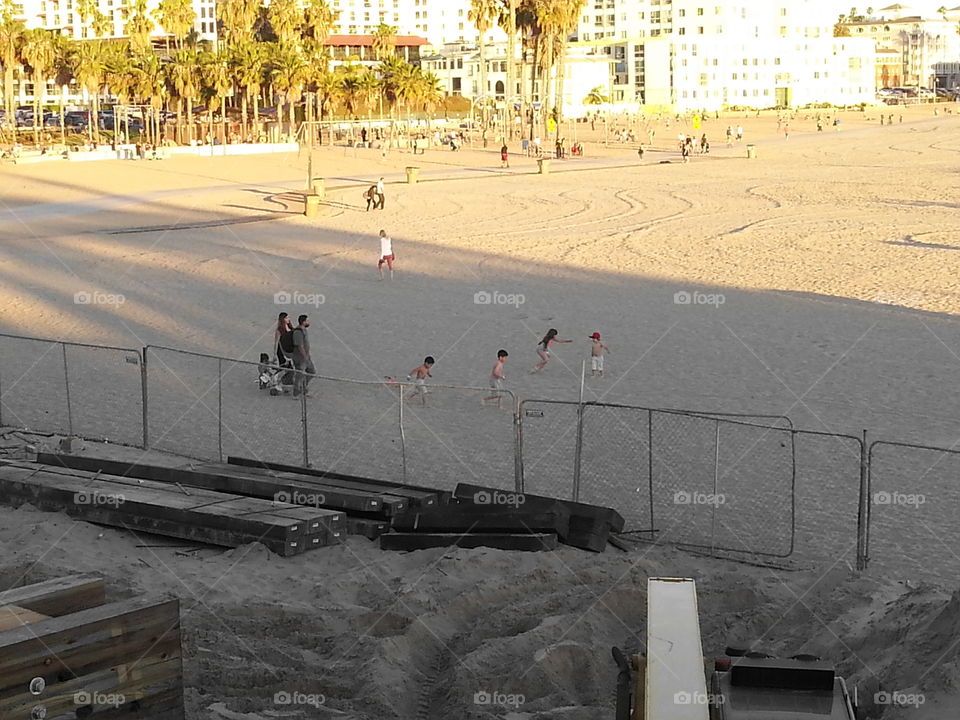 children playing at the beach