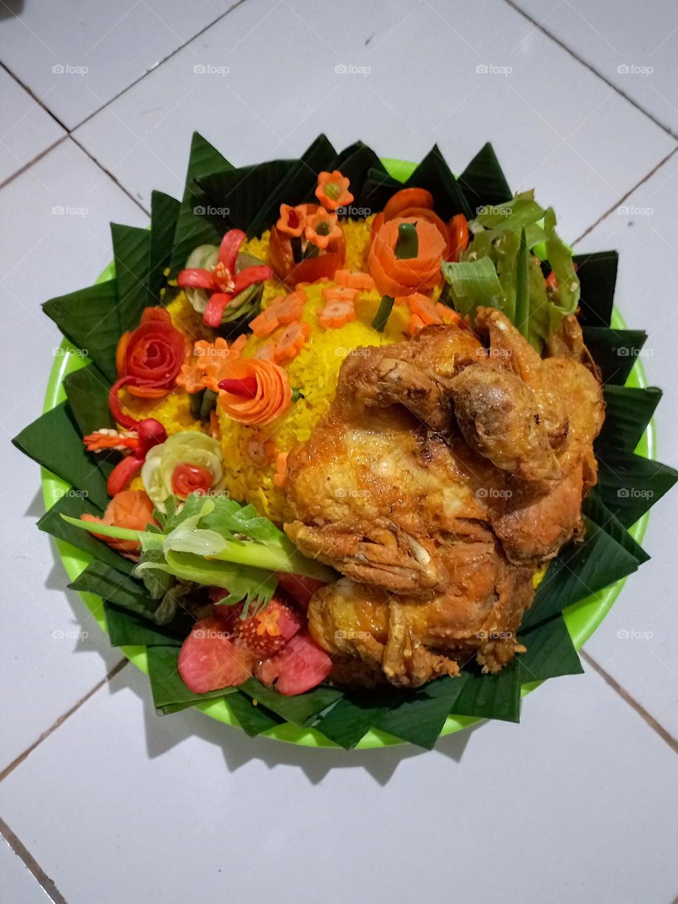 Tumpeng or tumpeng rice is a dish served at Indonesian traditional ceremonies