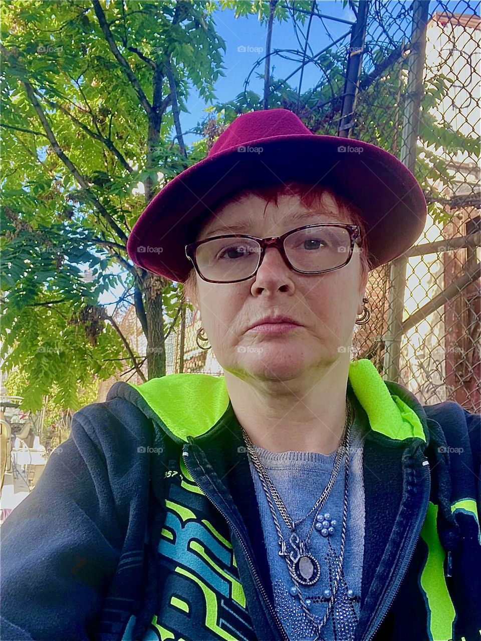 This is me, „Petra Schiller“ a.k.a. „Maxine Firefox“ a.k.a. „Maximiliane Feuerfuchs“ standing in the parking lot beneath the „Pulaski Bridge“ at „Newtown Creek“ on a sunny autumn day in October 2023. Hypnotic Productions