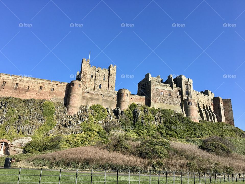 Beautiful blue sky at Bamburgh Castle Northumberland February pretending it’s Summer 