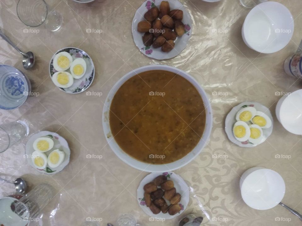 Moroccan table in Ramadan month:  Soup. Date and eggs.