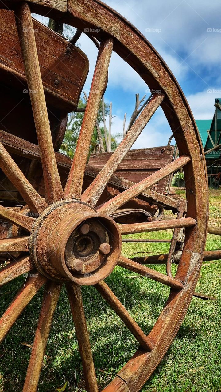 Wood meets metal.  wagon wheel