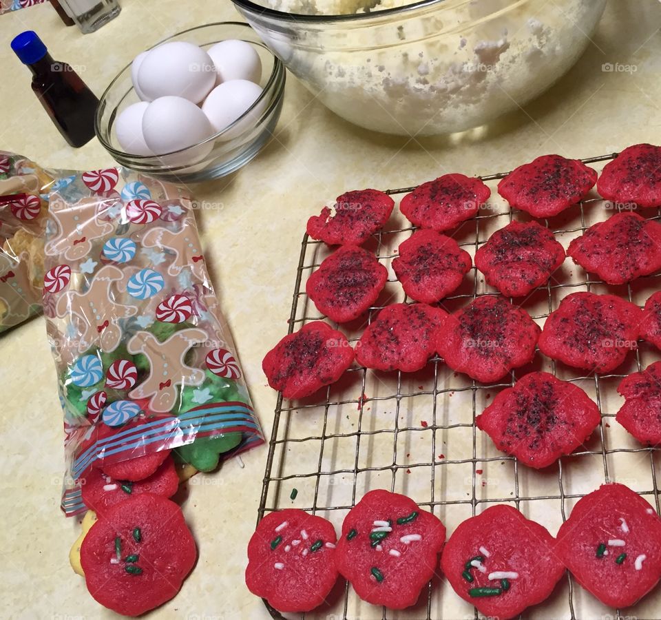 Making red holiday cookies 